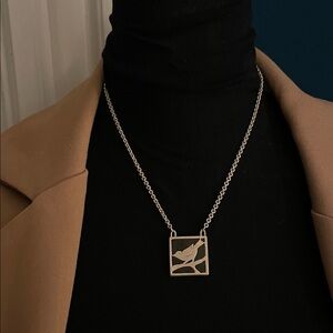 Elegant Silver Bird Pendant Necklace